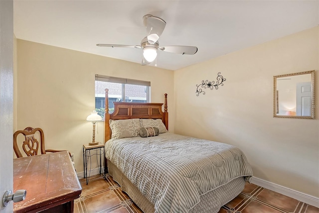 tiled bedroom with ceiling fan