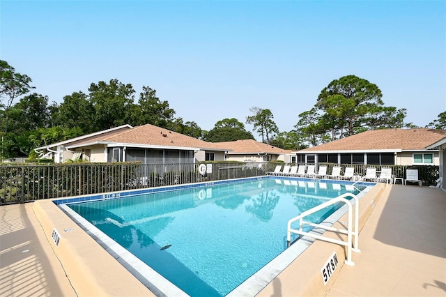 view of pool featuring a patio area