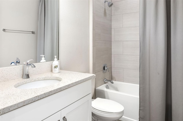 full bathroom featuring vanity, toilet, and shower / tub combo with curtain