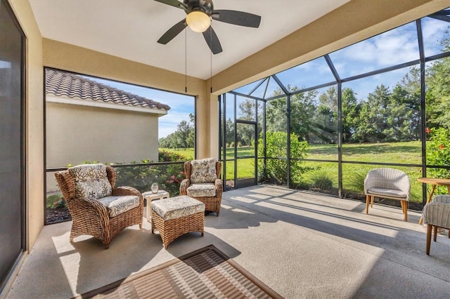 sunroom / solarium with ceiling fan