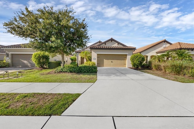 view of front facade featuring a front lawn and a garage