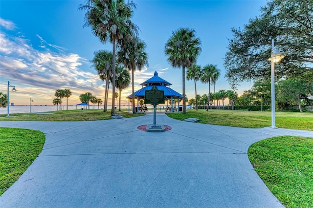 surrounding community with a gazebo and a lawn