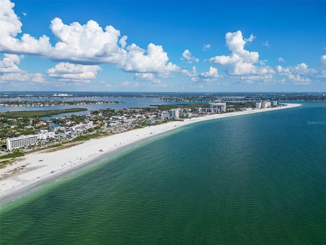 bird's eye view featuring a view of the beach and a water view