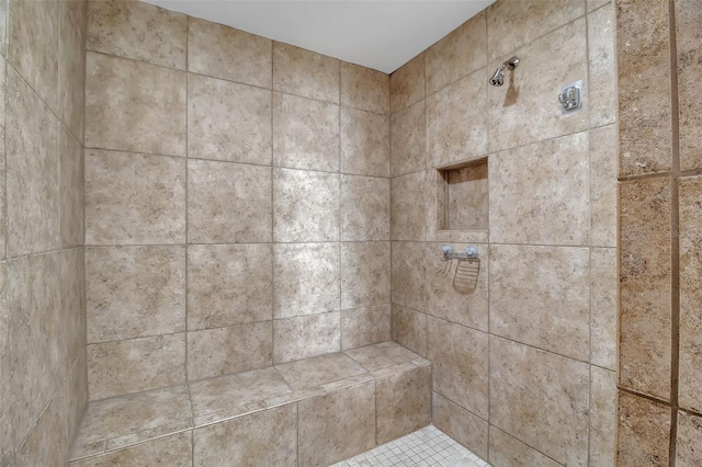 details featuring a tile shower