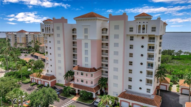 view of building exterior with a water view