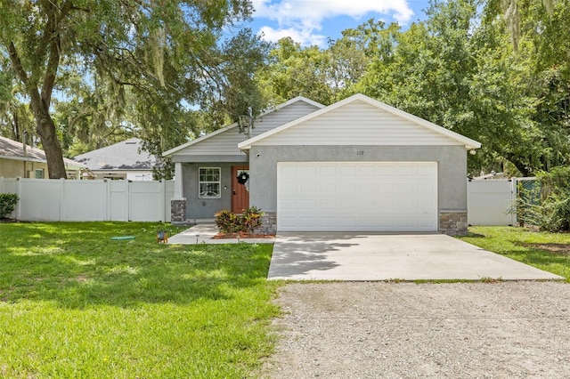 ranch-style home featuring a garage and a front yard