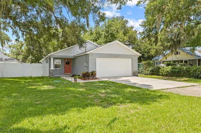 ranch-style home featuring a garage and a front yard