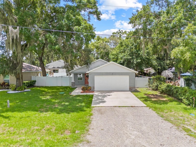 view of front of house featuring a garage and a front yard