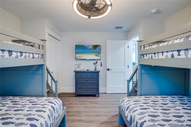 bedroom with light hardwood / wood-style floors