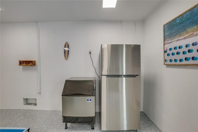 interior space with stainless steel fridge