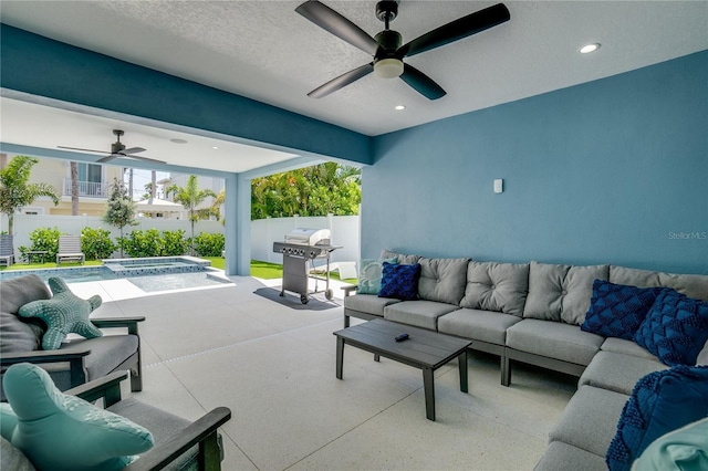 view of patio / terrace with grilling area, an outdoor living space, a swimming pool with hot tub, and ceiling fan