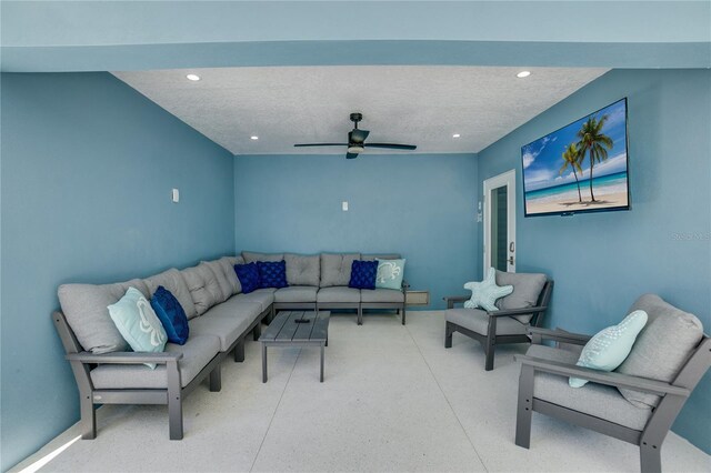 living room featuring ceiling fan