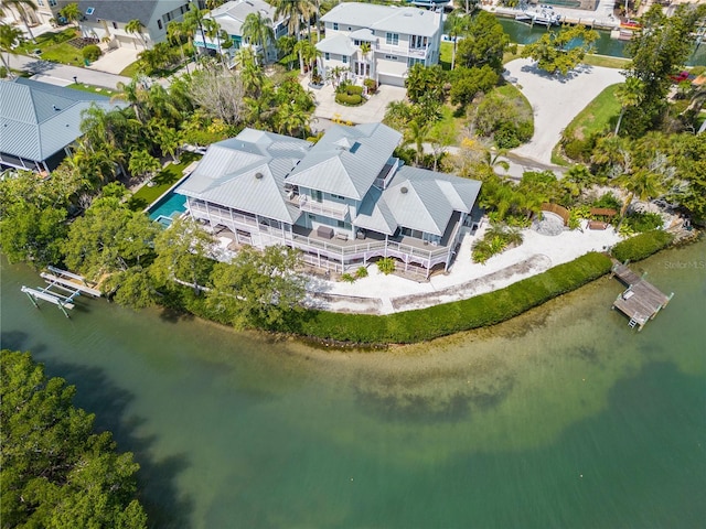 aerial view featuring a water view and a residential view