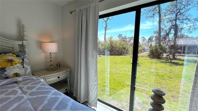 bedroom featuring multiple windows