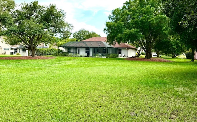 view of yard featuring a lanai