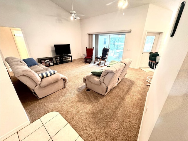 living room featuring carpet, high vaulted ceiling, and ceiling fan