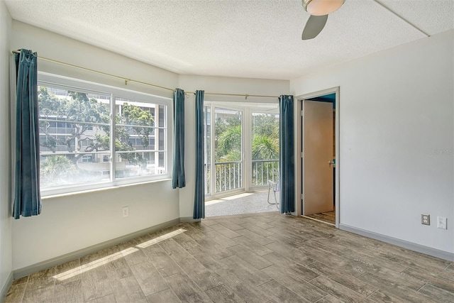 spare room with ceiling fan