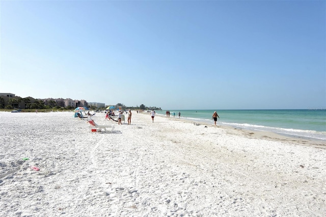 view of water feature with a beach view