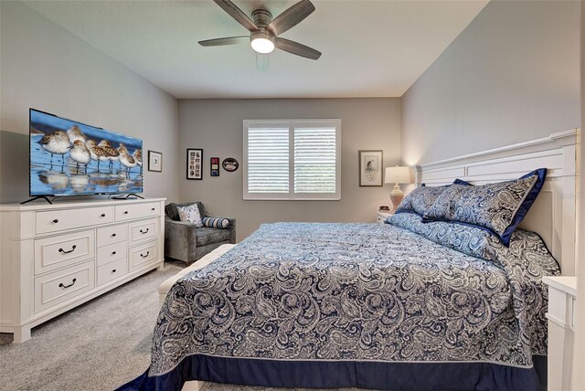 8930 Tuscany Isles Dr, Punta Gorda, FL 33950 - bedroom featuring light colored carpet and a ceiling fan