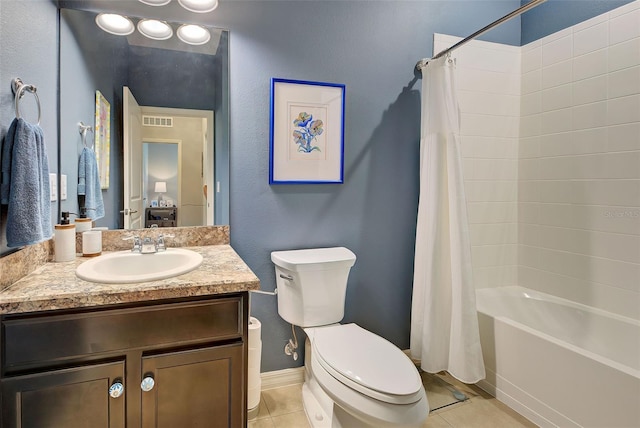 full bathroom featuring vanity, tile patterned floors, shower / bath combination with curtain, and toilet