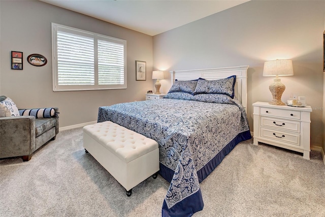 8930 Tuscany Isles Dr, Punta Gorda, FL 33950 - bedroom featuring light carpet and baseboards