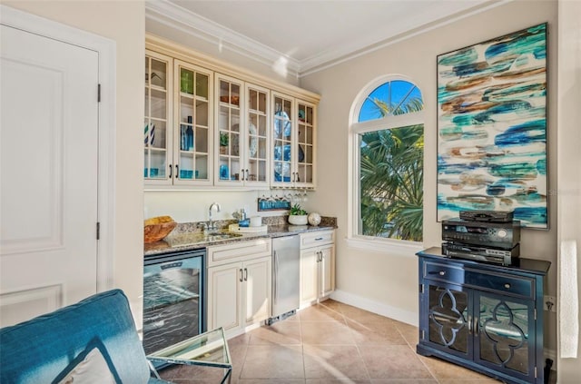 bar featuring light tile patterned floors, wine cooler, stone counters, ornamental molding, and sink