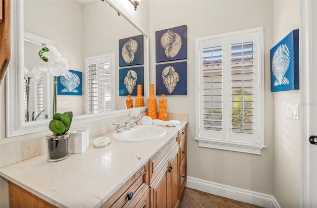 bathroom featuring tile patterned floors and vanity