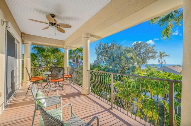 wooden deck with ceiling fan