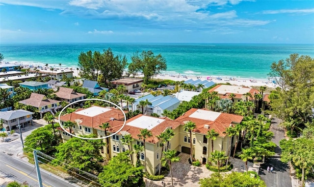 aerial view with a beach view and a water view