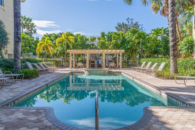 view of swimming pool with a pergola and a patio area