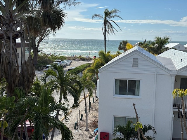 property view of water featuring a beach view