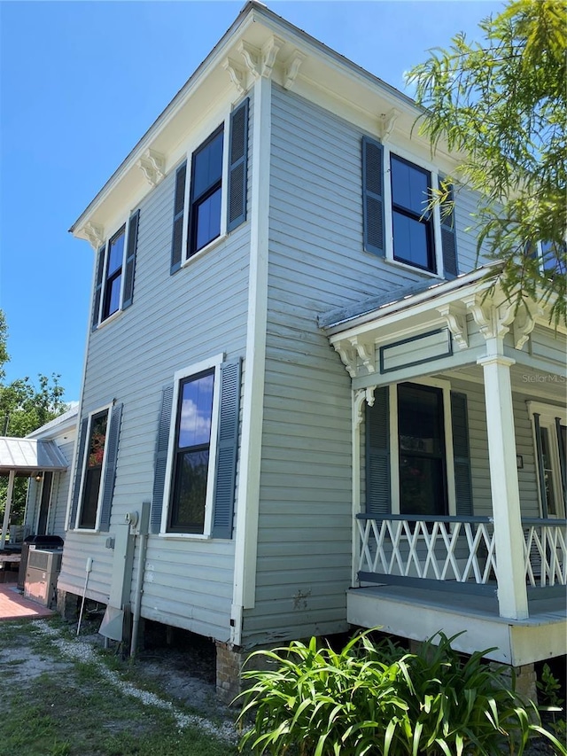 view of home's exterior featuring covered porch