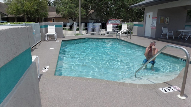 view of pool with a patio area