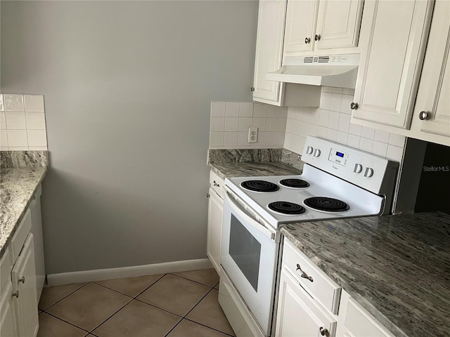 kitchen featuring backsplash, white cabinetry, white electric stove, and light tile patterned flooring