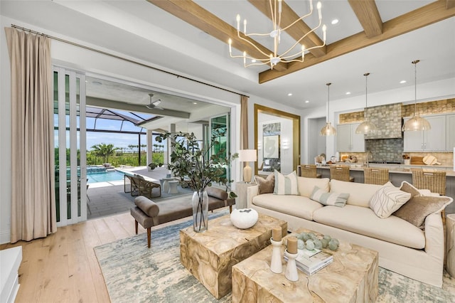 living room with light hardwood / wood-style floors and beam ceiling