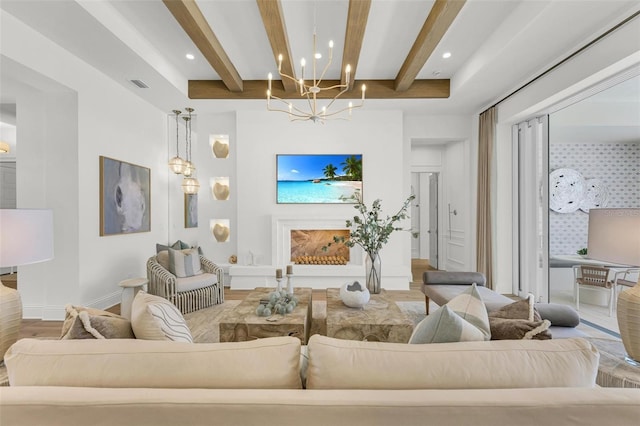 living room featuring wood-type flooring, beam ceiling, and a notable chandelier