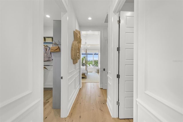 hall featuring light hardwood / wood-style flooring