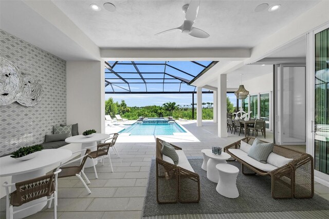 view of swimming pool featuring ceiling fan