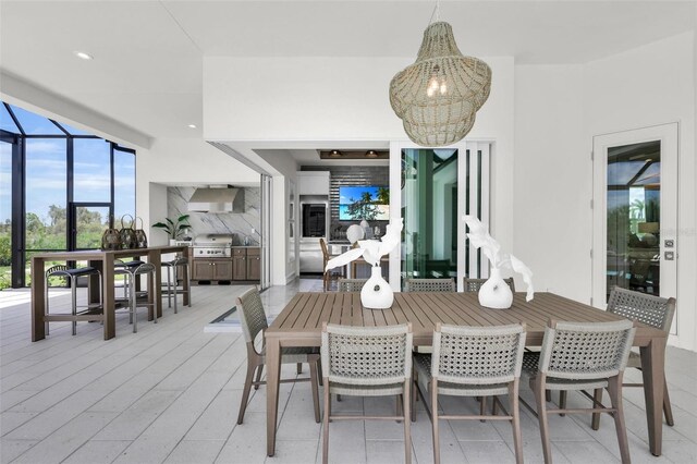 dining space with a chandelier