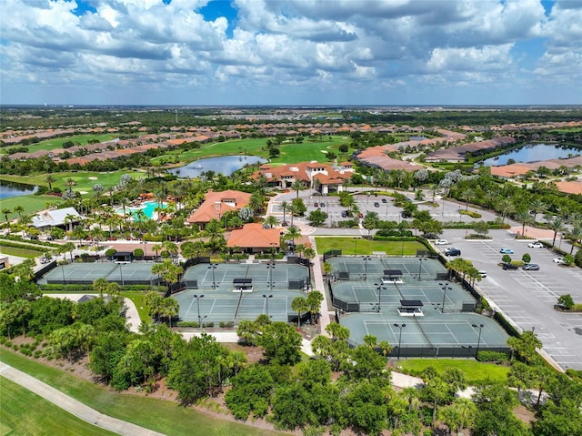 birds eye view of property featuring a water view and a residential view