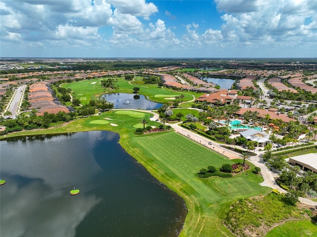 bird's eye view with a water view and golf course view