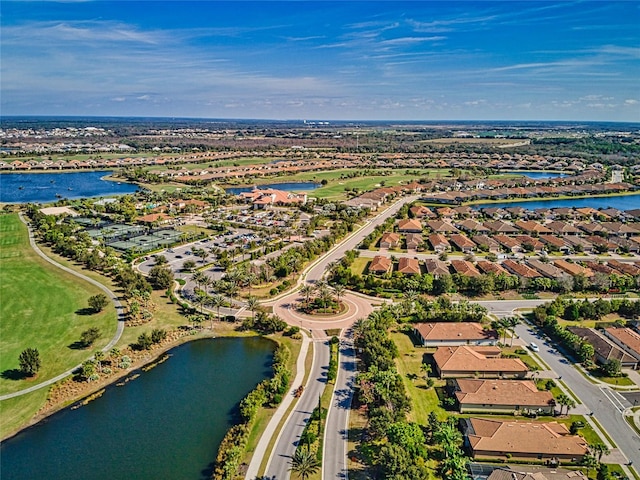 birds eye view of property featuring a residential view and a water view