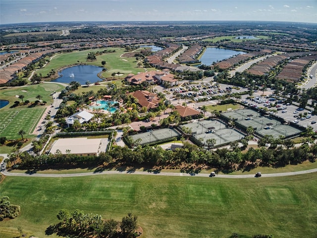 bird's eye view with golf course view and a water view