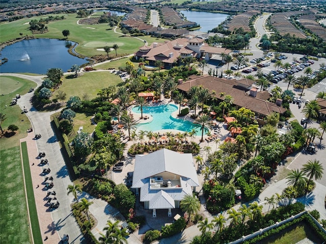 aerial view featuring a water view and golf course view