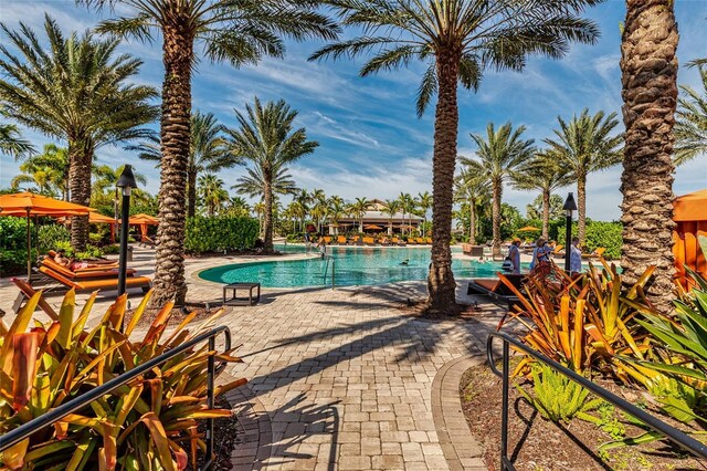 community pool featuring a patio area