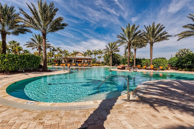 pool with a patio