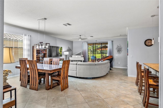 dining space featuring light tile patterned floors, ceiling fan, and crown molding