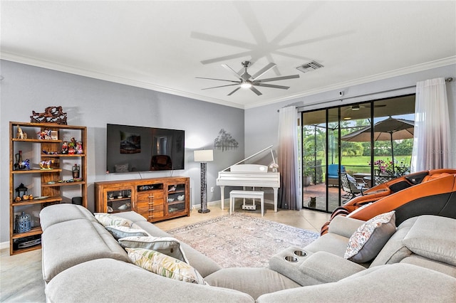 living room featuring ceiling fan, light tile patterned floors, and ornamental molding