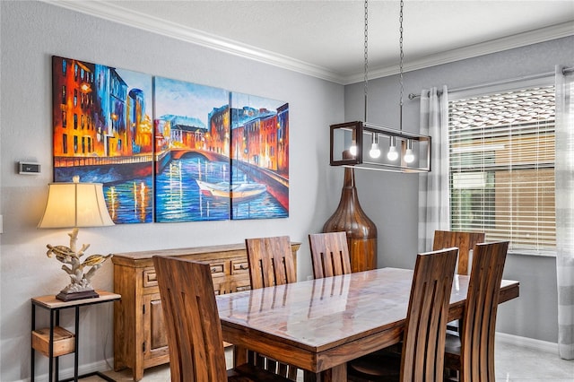 dining room featuring ornamental molding