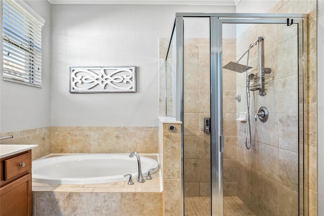 bathroom featuring plus walk in shower and vanity